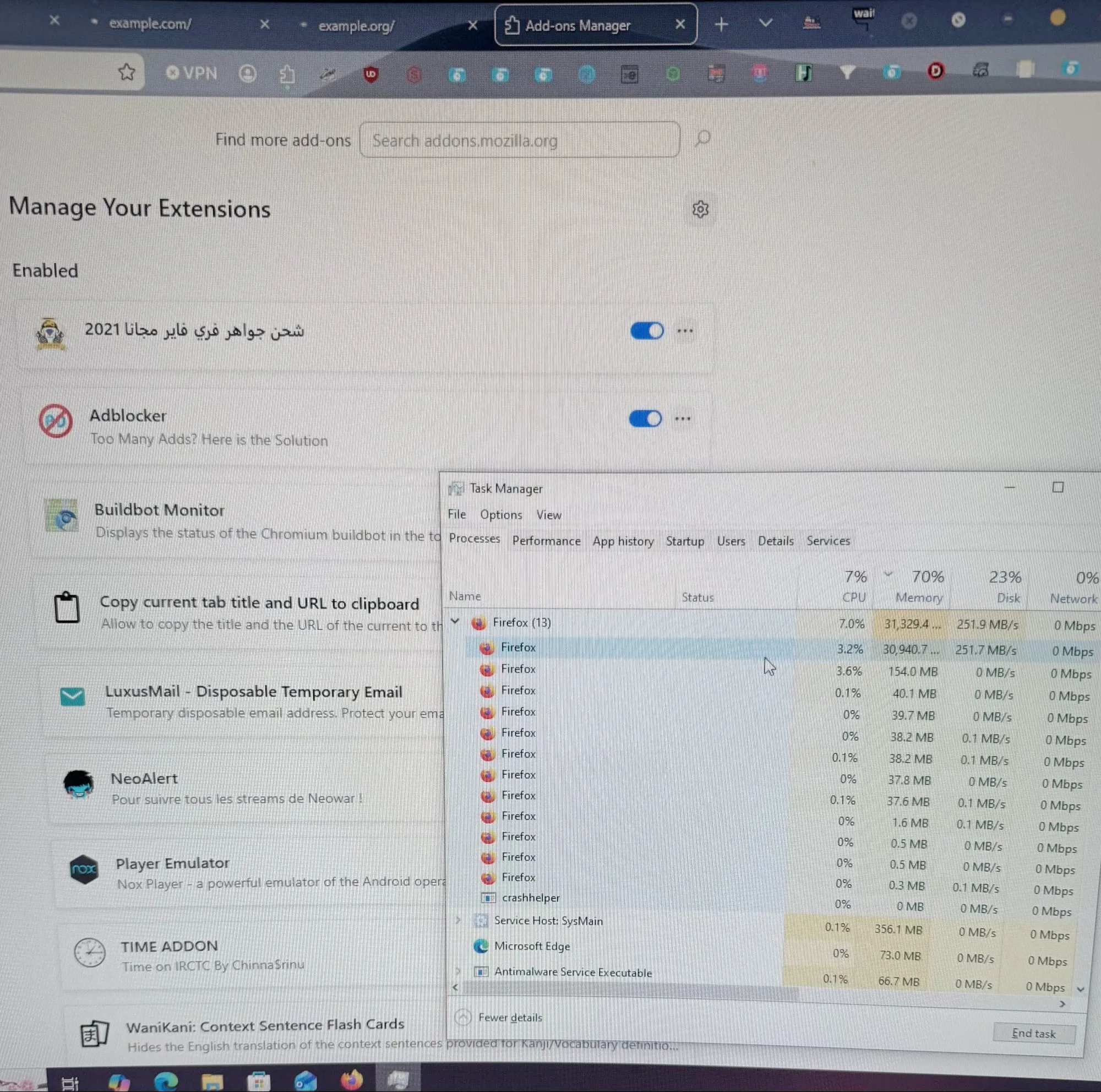 Firefox using 31329 MiB of memory as about:addons is displayed. There's a shit ton of extensions, example.com and example.org are open in the background still loading, and Tab Counter has a badge of "wait"
